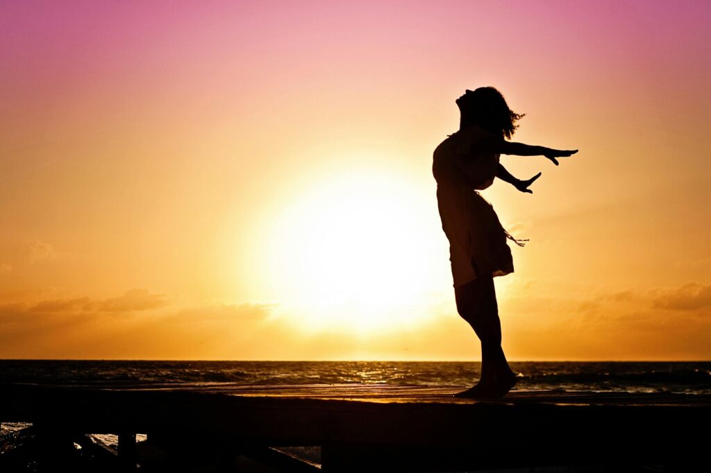 Lady in Beach Silhouette during Daytime Photography